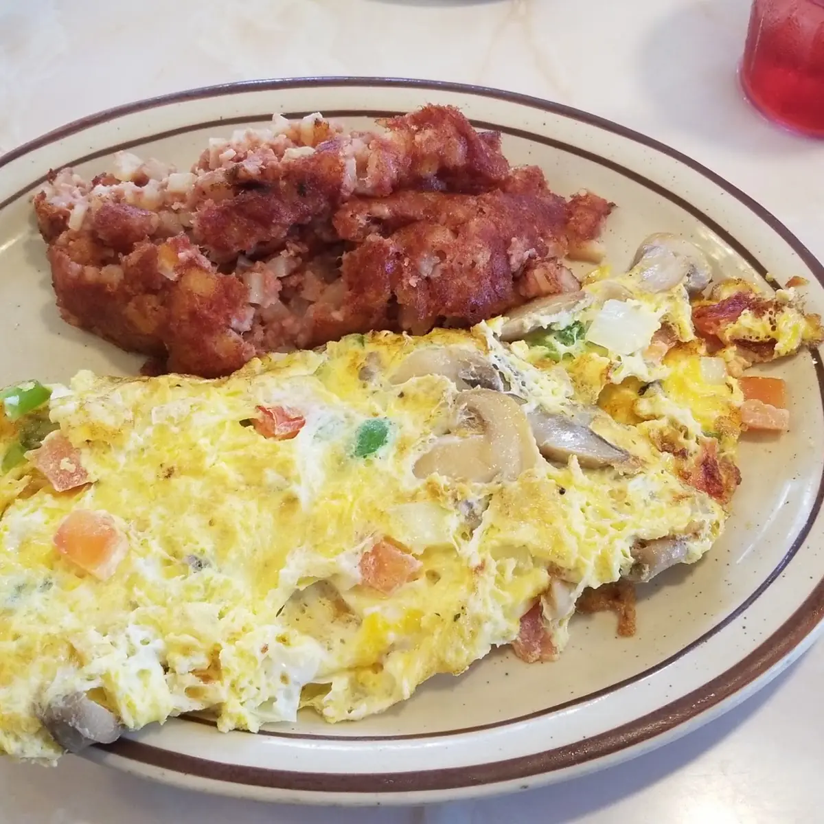 Vegetarian Omelette and Corned Beef Hash
