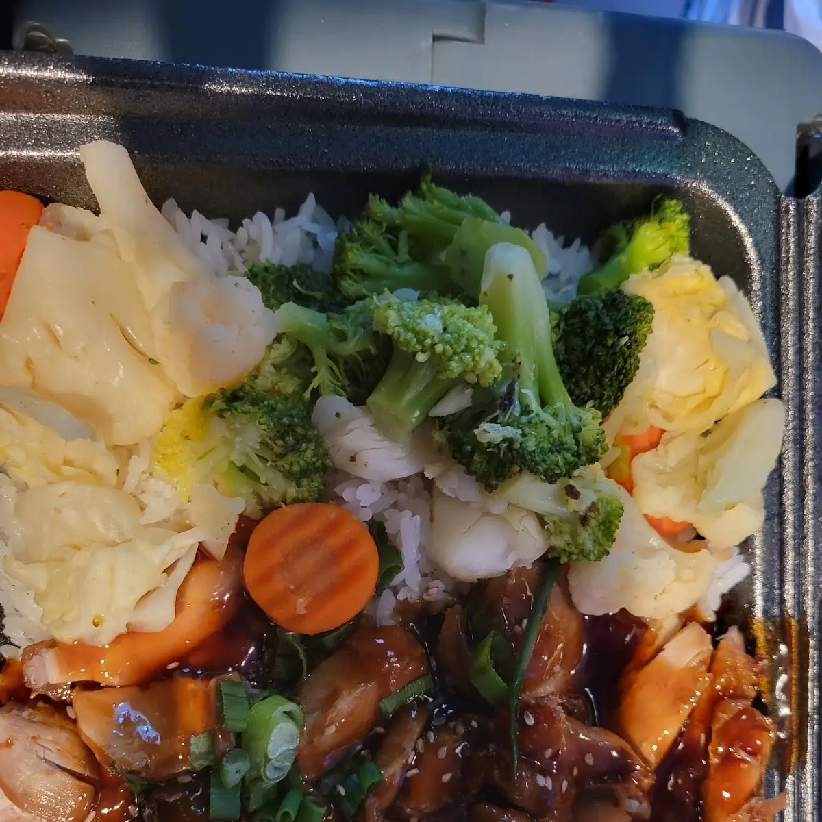 A Large Chicken Bowl with Vegetables