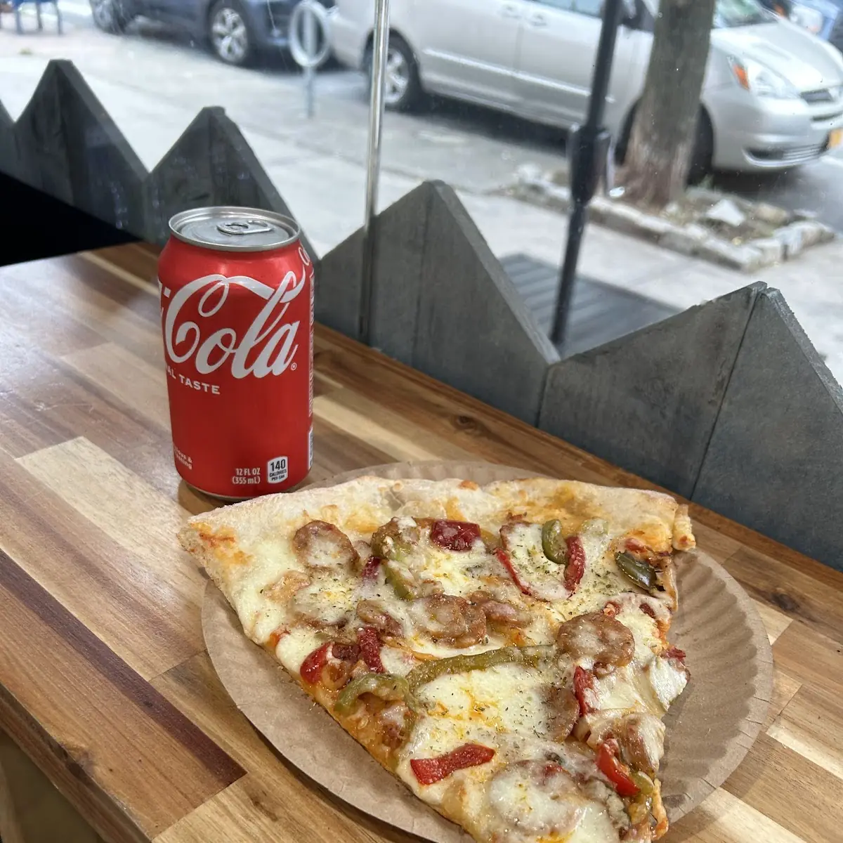 Sausage Pepper Onion & Pepperoni Pizza Slice