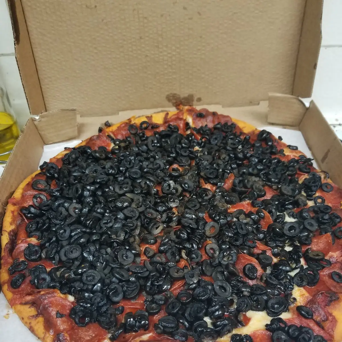 Pepperoni and Black Olive Pizza