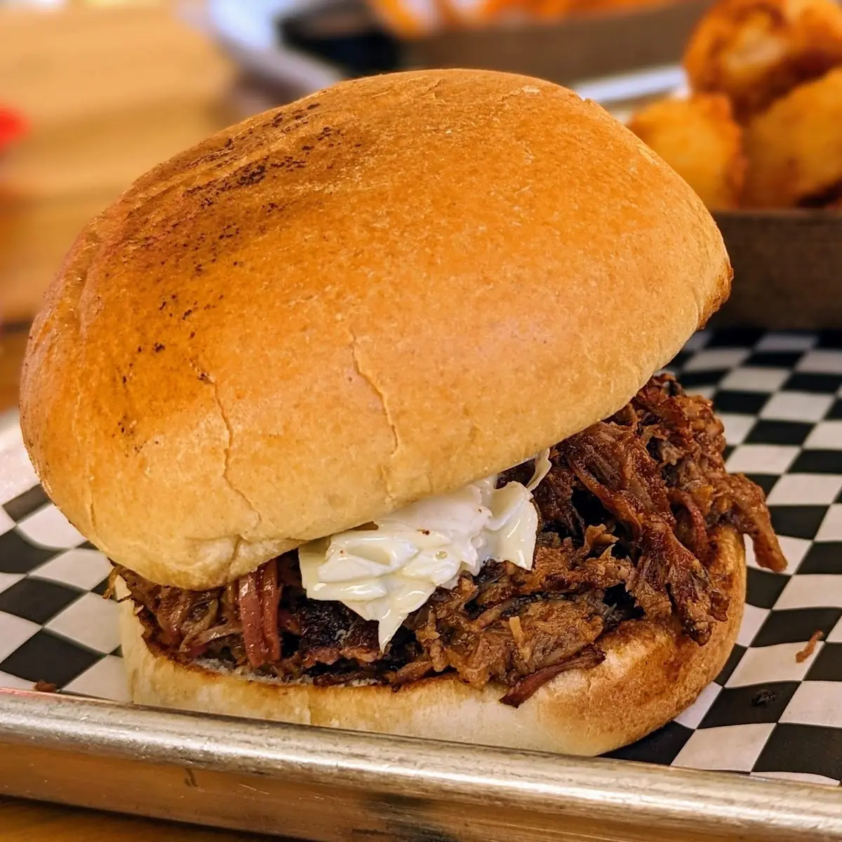 Pulled Pork Sandwich with Onion Rings