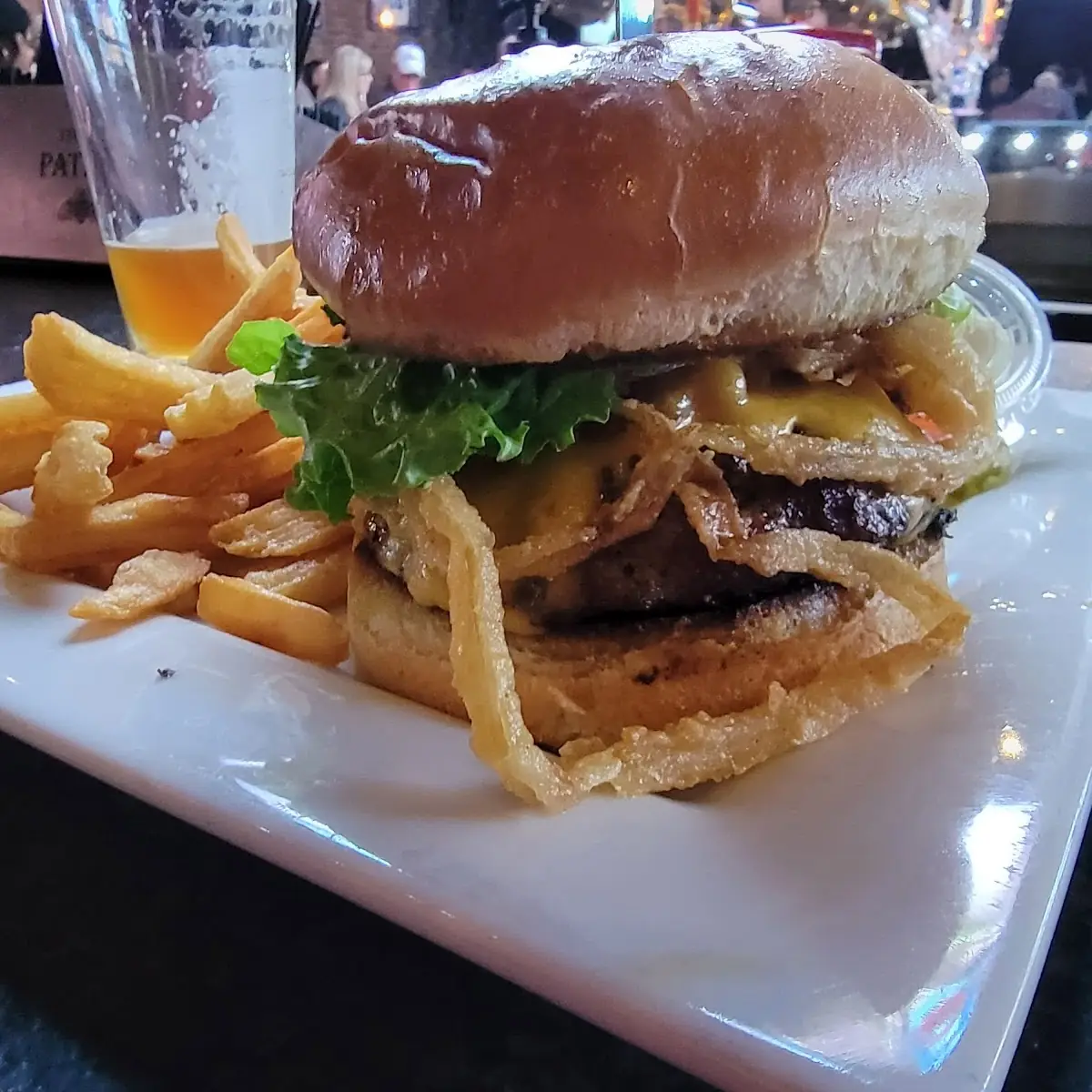 Blitz Burger with Lettuce Tomato Bacon Cheddar Fried Onion Straws