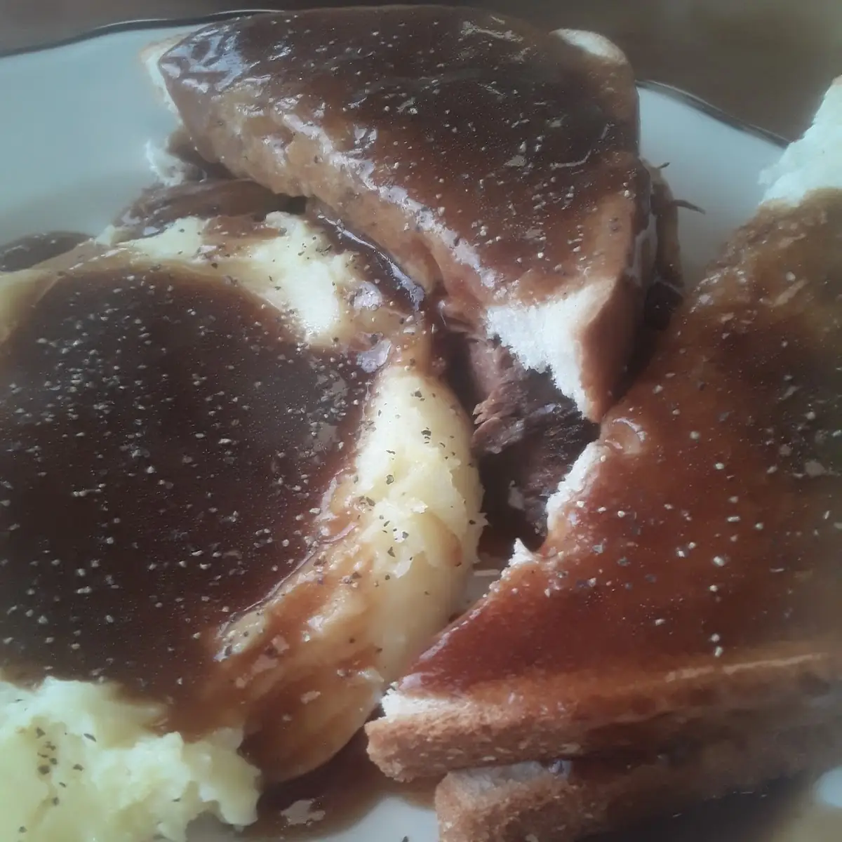 Hot Roast Beef Sandwich with Mashed Potatoes and Beef Gravy