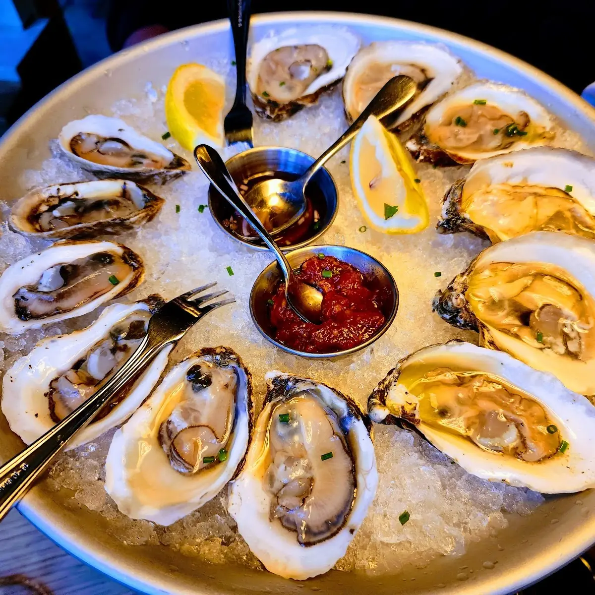 Quatre Big Tiny Oysters Rockefeller