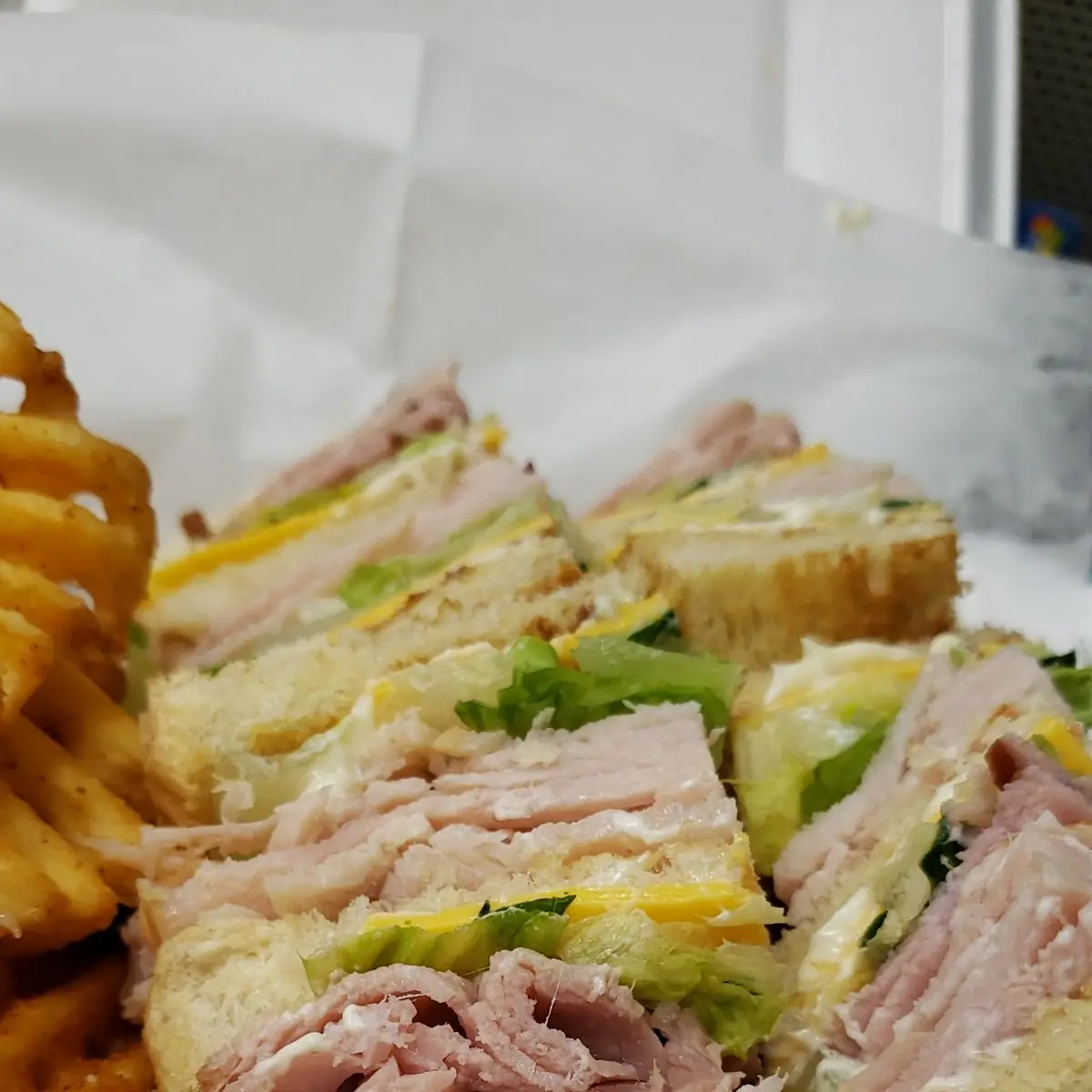 Club Sandwich and Waffle Fries