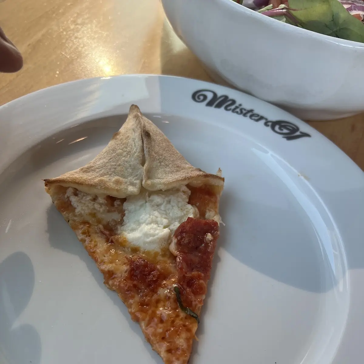 Pizza Slice with Basil Leaf