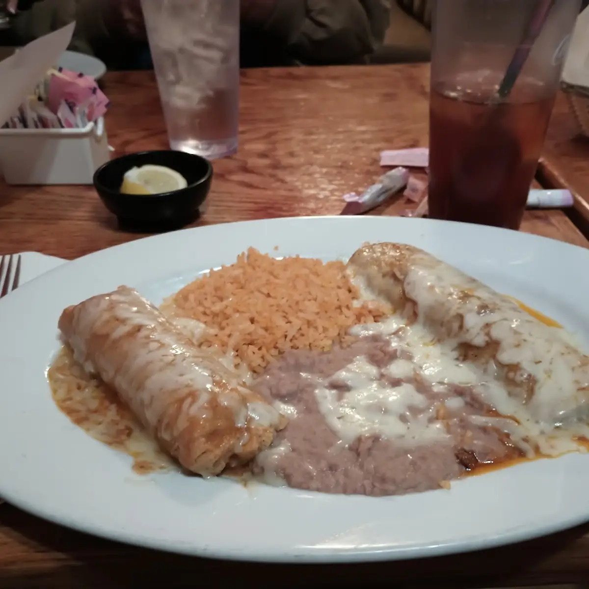 Combo 2 Ground Beef Enchilada and Chicken Tamale with Refried Beans and Spanish Rice
