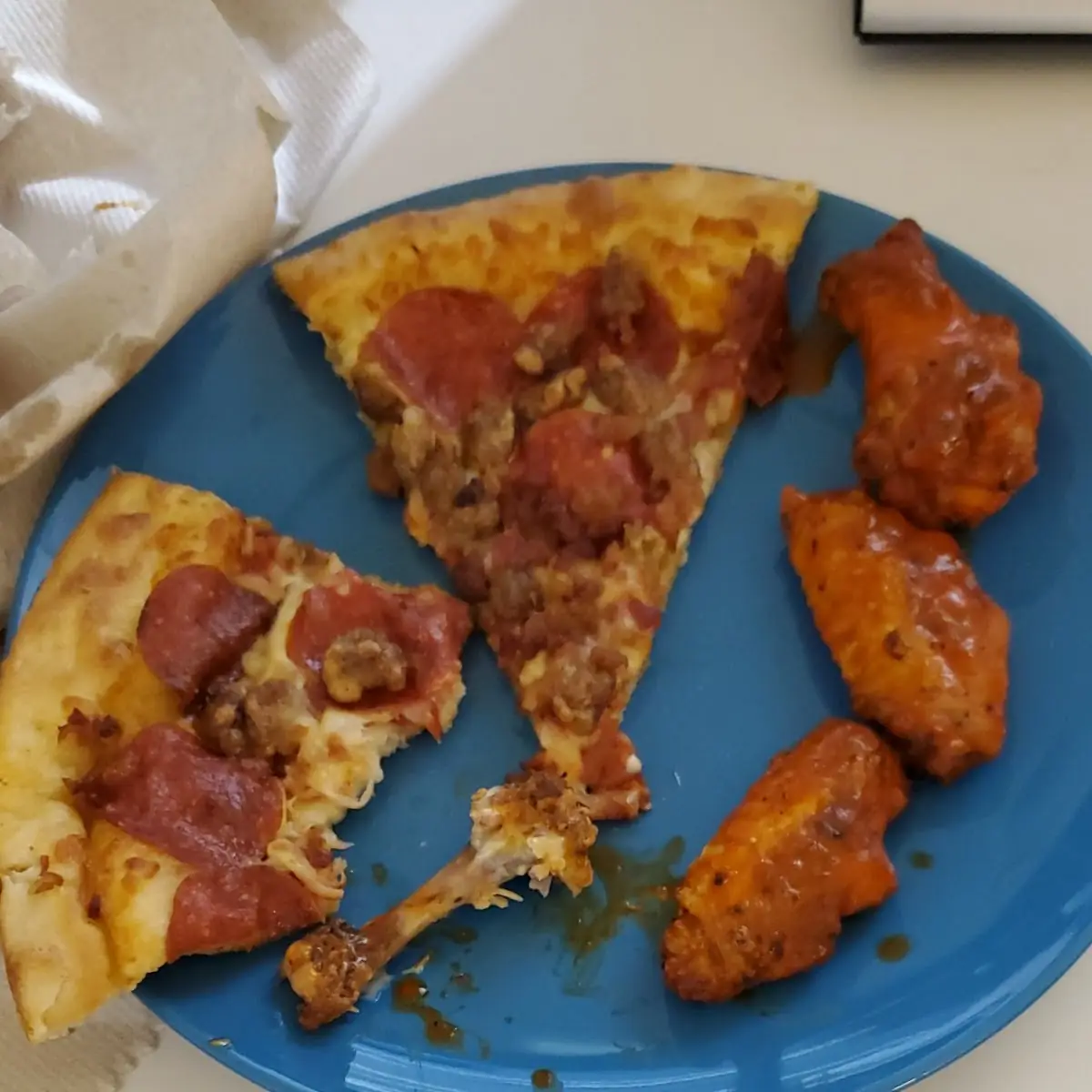 Three Meat Pizza and Buffalo Wings