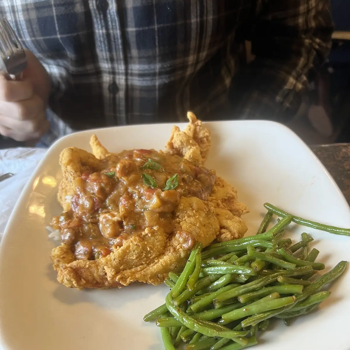 Crawfish Etouffee' over Fried Fish