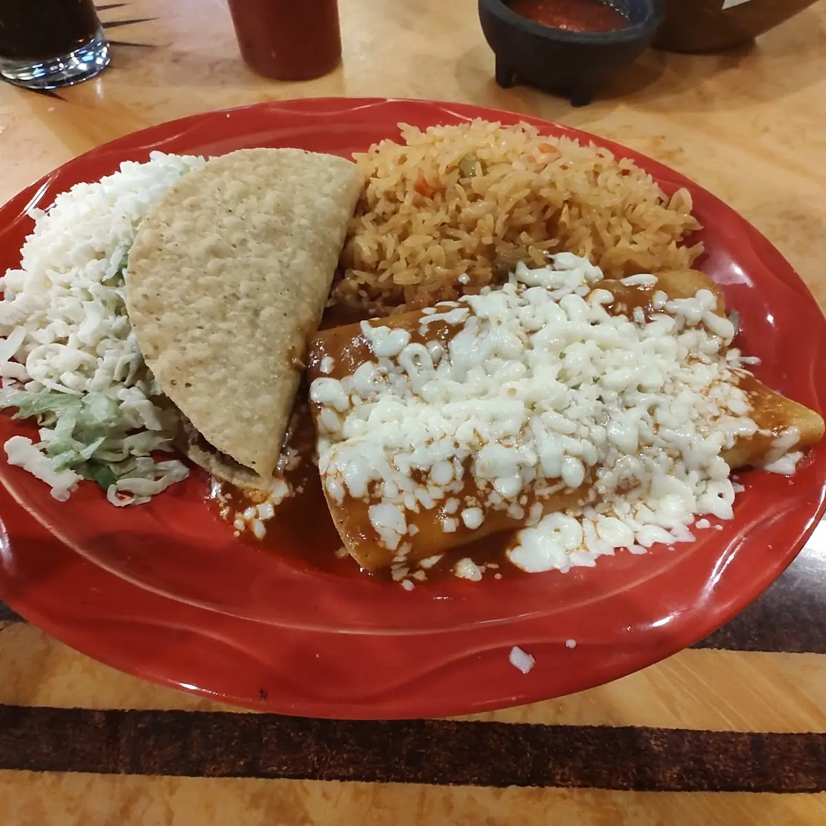 One Chile Poblano & One Cheese Enchilada Served with Refried Beans & Spanish Rice