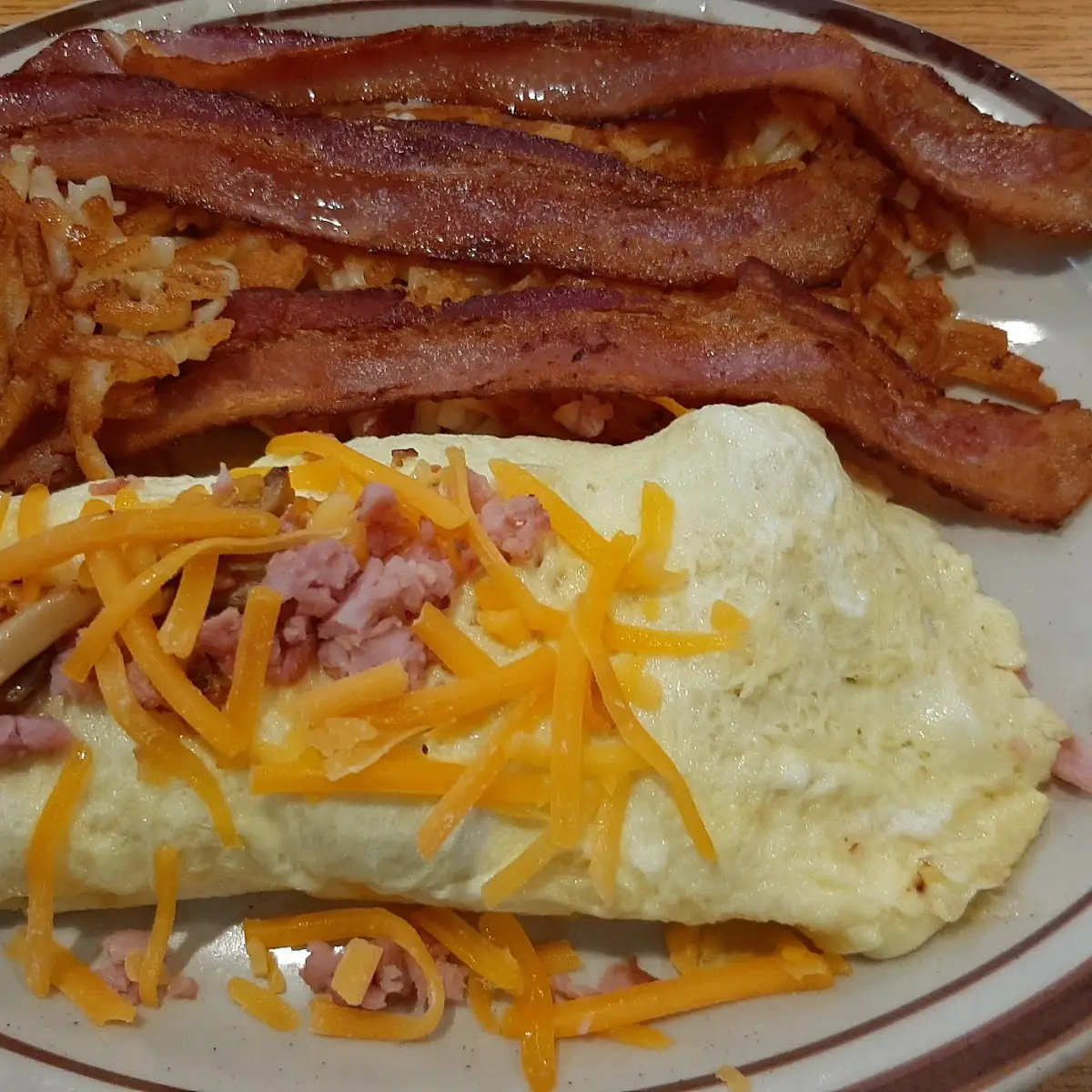 Ham Cheese Mushroom Omlete with Bacon and Hashbrowns