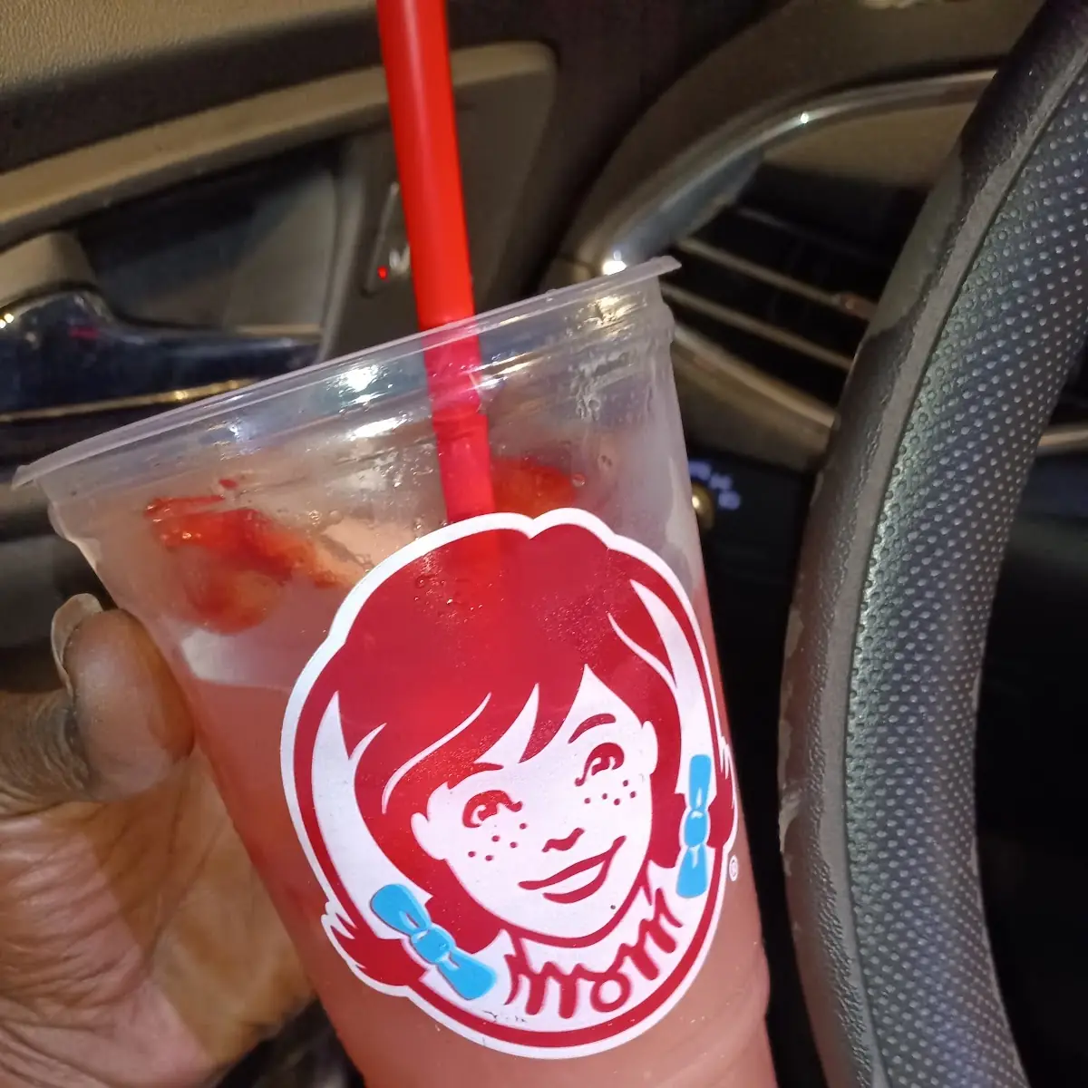 Pomegranate Strawberry Lemonade with Strawberries on Top
