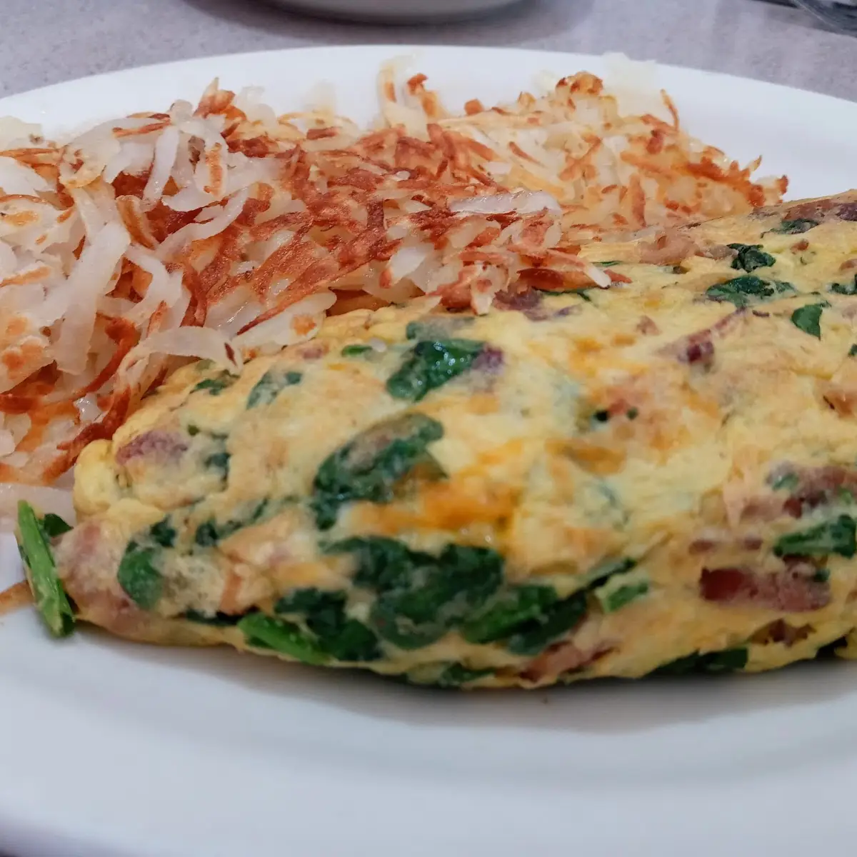 Spinach with Cheese Omelet and Hash Browns