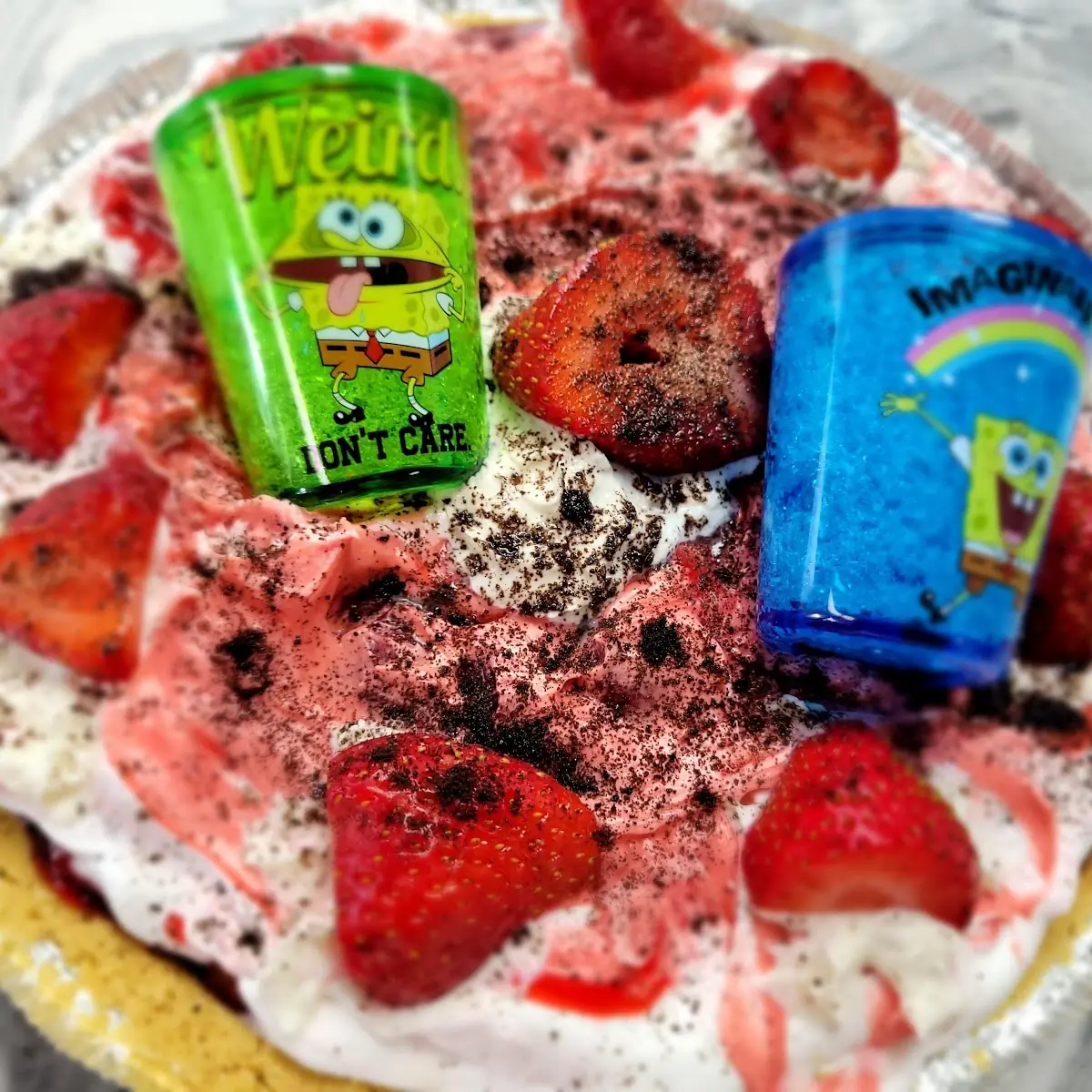 Strawberry Cheesecake Topped with Shot Glasses for Pool Catering