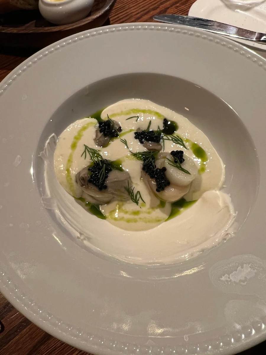 Poached Scallops and Oysters Labneh Mujol Caviar and Potatos