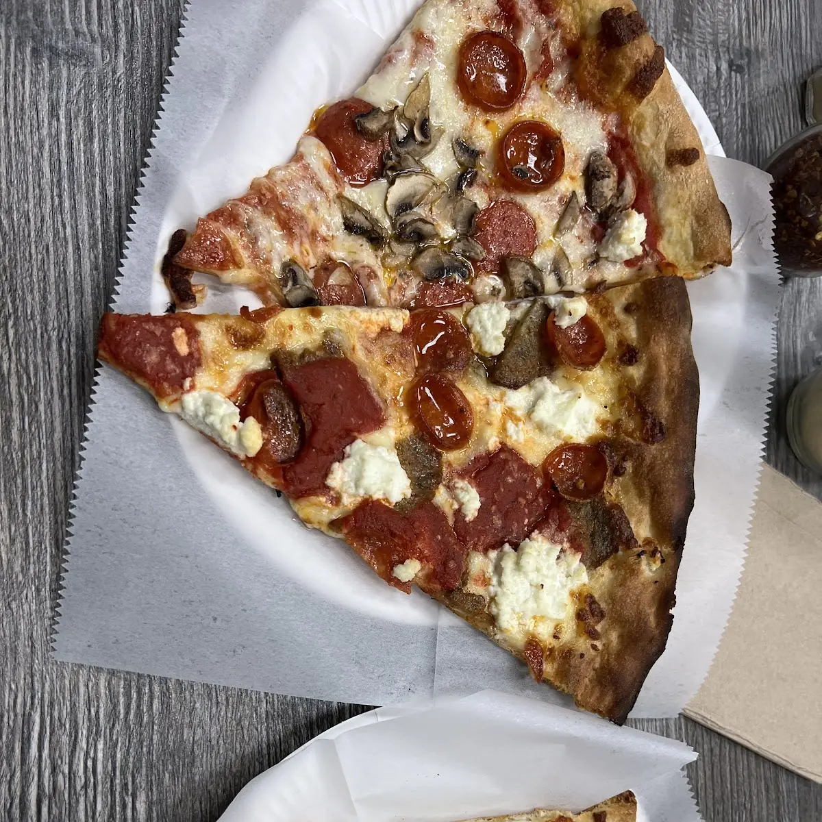 Meat Lovers and House Pizza Slices