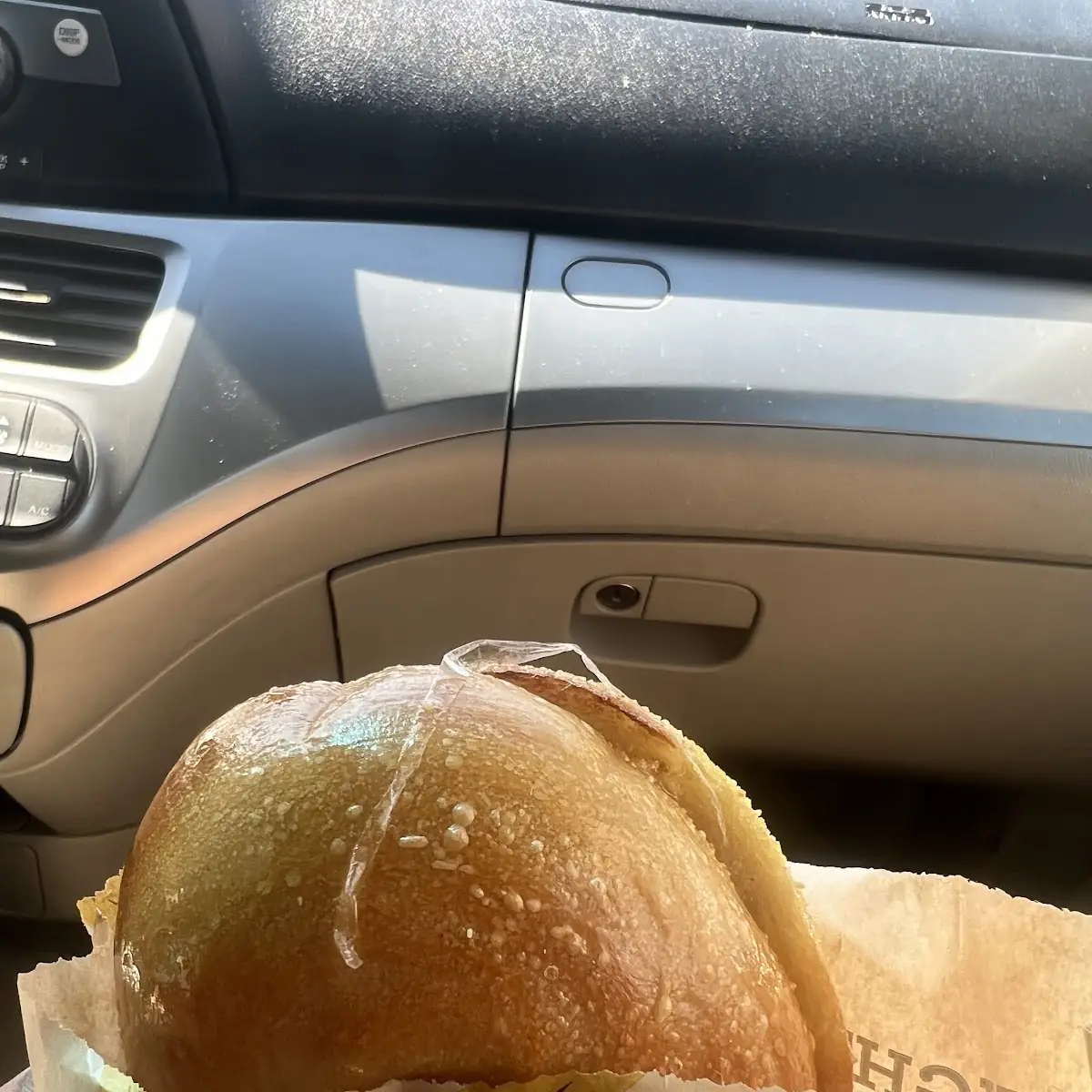 Plain Bagel with Butter and Plastic