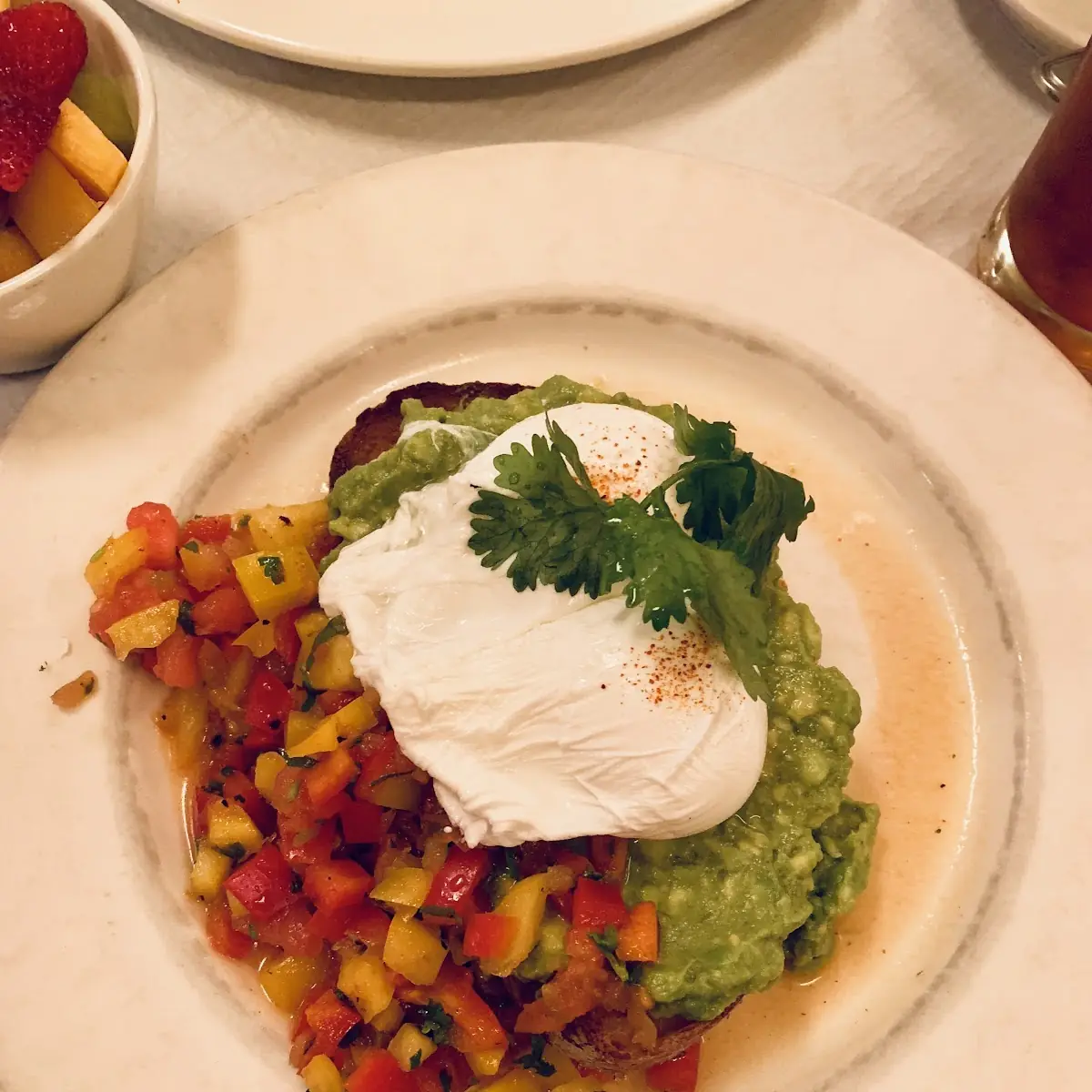 Avocado and Poached Eggs on Toast with Lemon-Herb Dressing