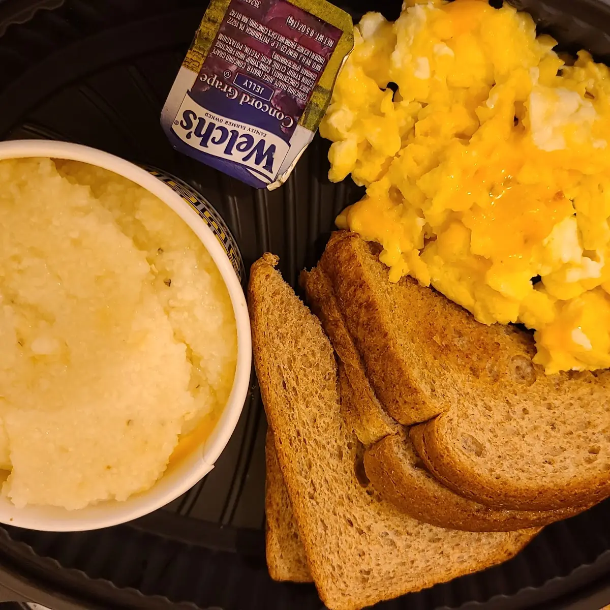 Grits with Cheese Scrambled Eggs with Cheese and Wheat Bread