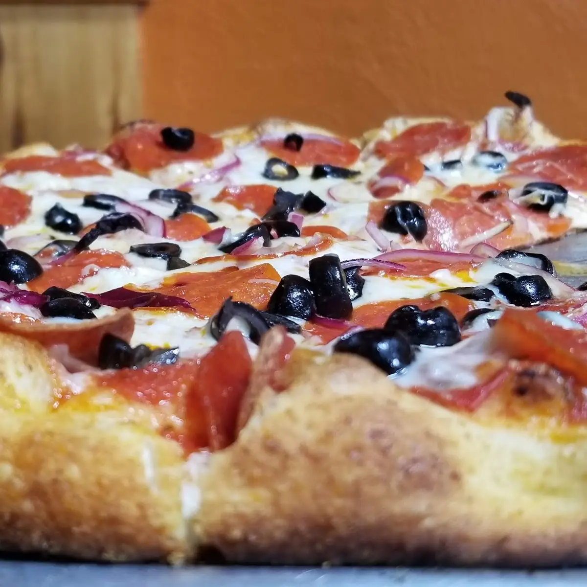 Pepperoni Black Olive & Purple Onion Pizza