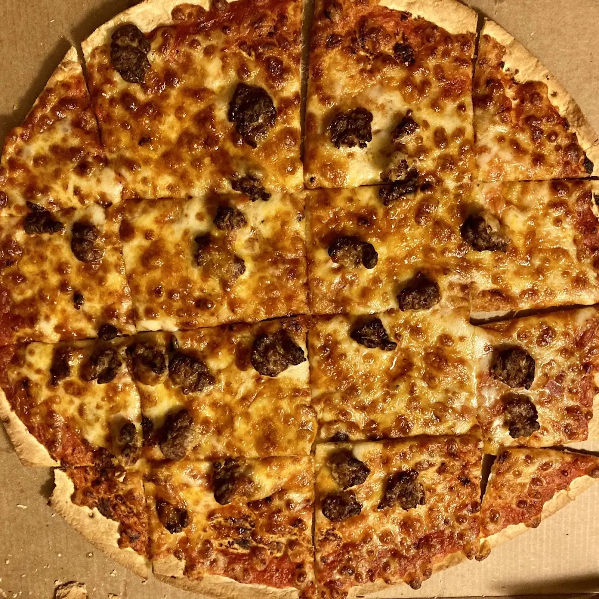 Thin Crust Cheese and Sausage Pizza