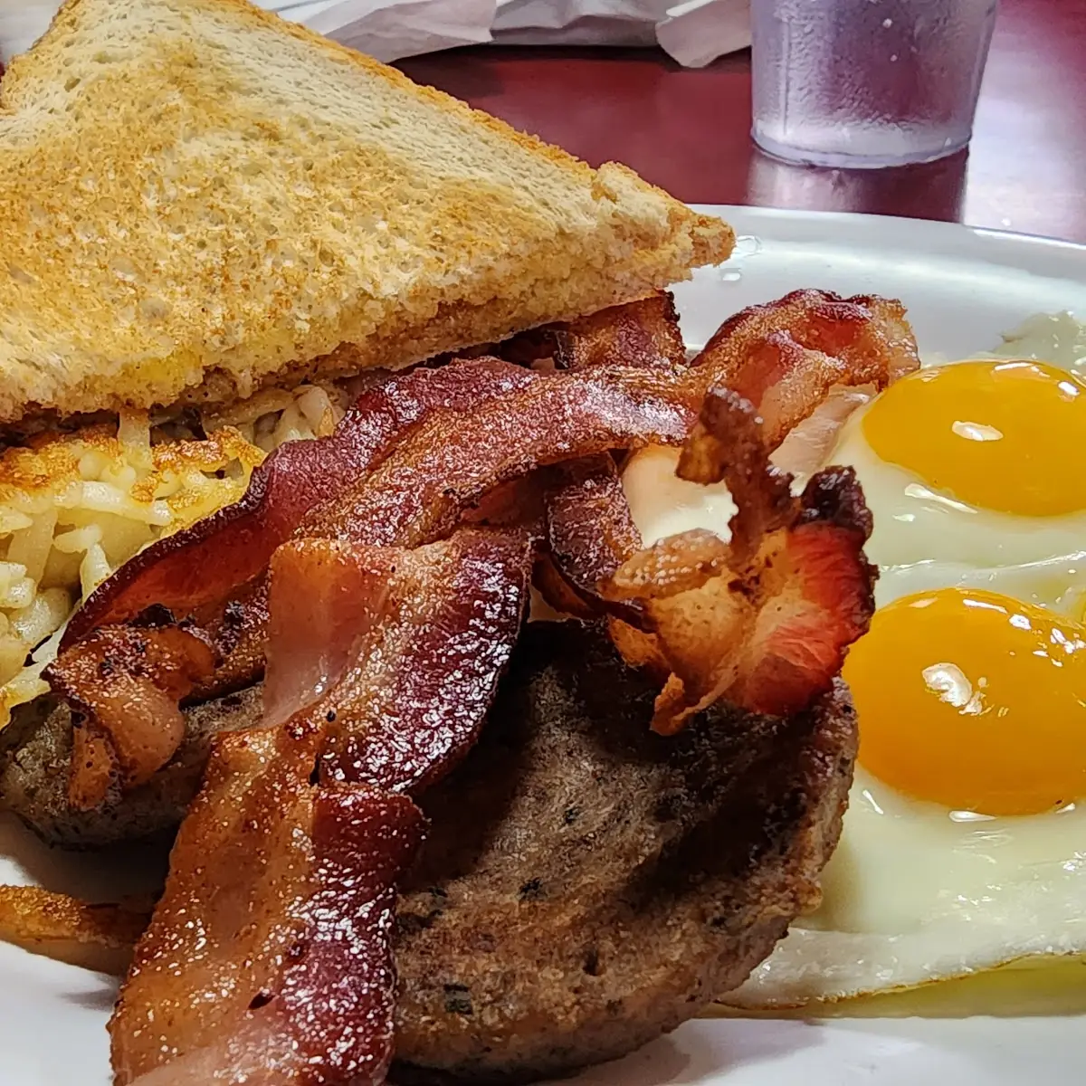 Eggs Bacon Hash Browns and Toast