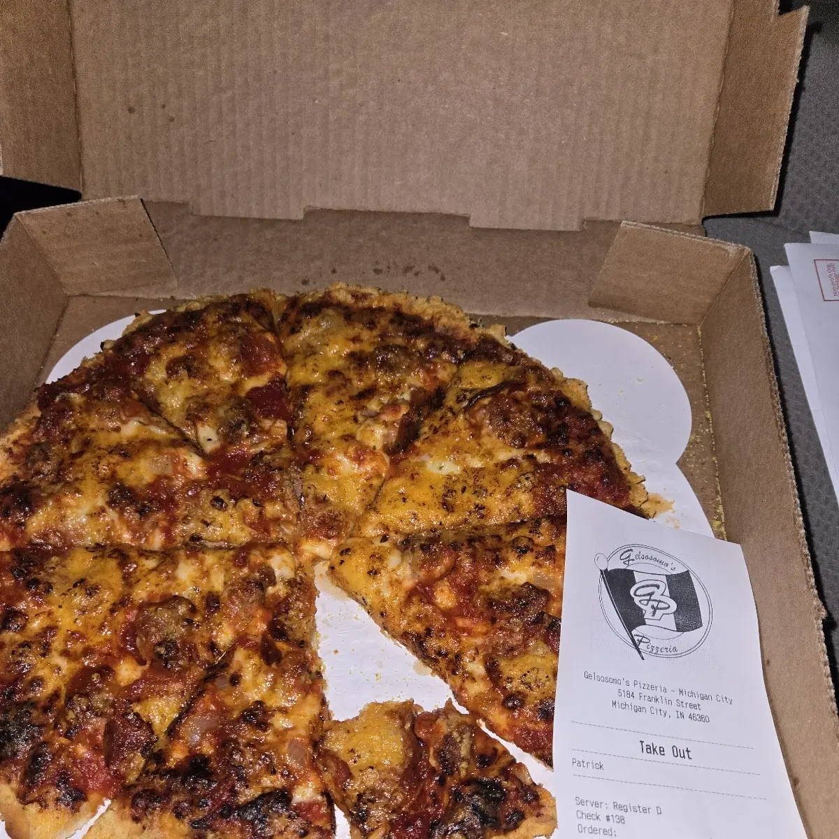 Small Pizza with Pepperoni Sausage Onions Cooked Well Done