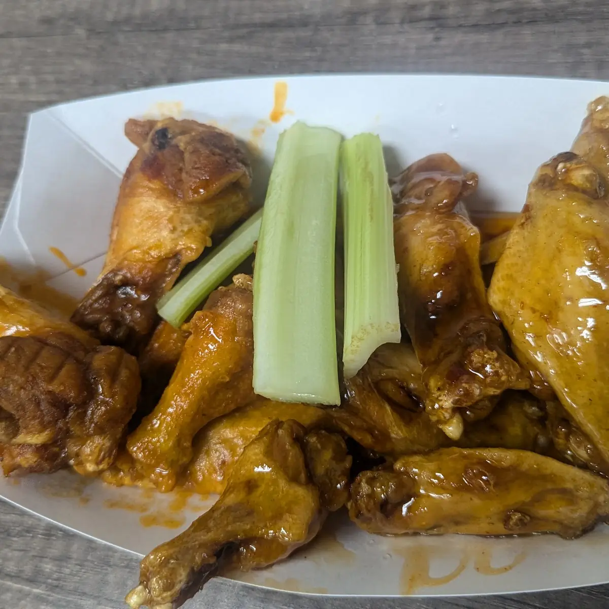 Glazed Chicken Wings with Celery Sticks