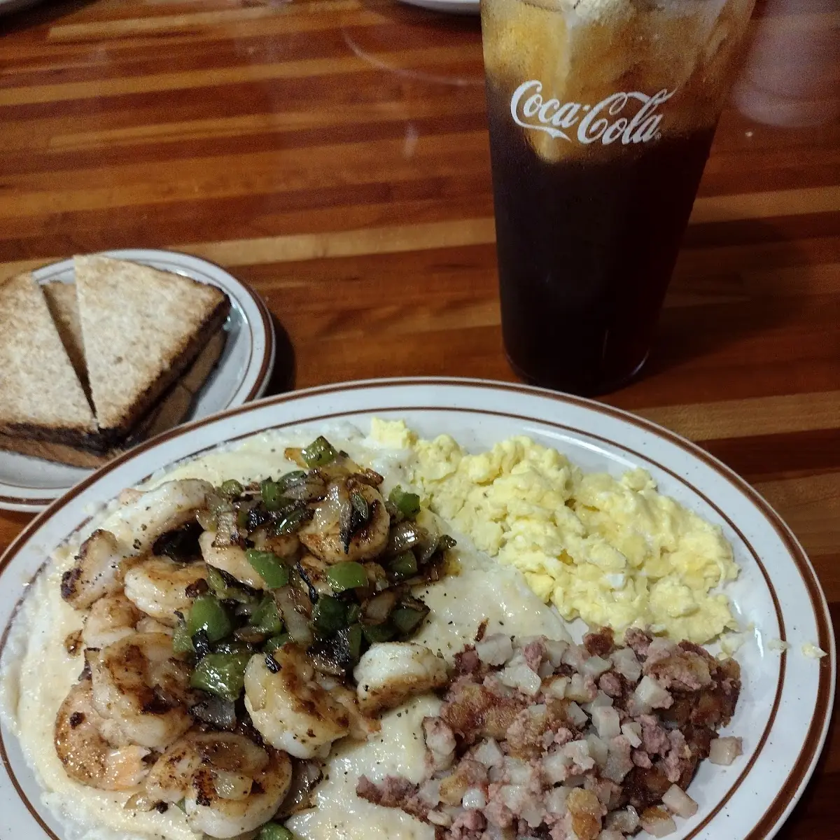 Grilled Shrimp Cheese Grits Scrambled Eggs and Corned Beef Hash