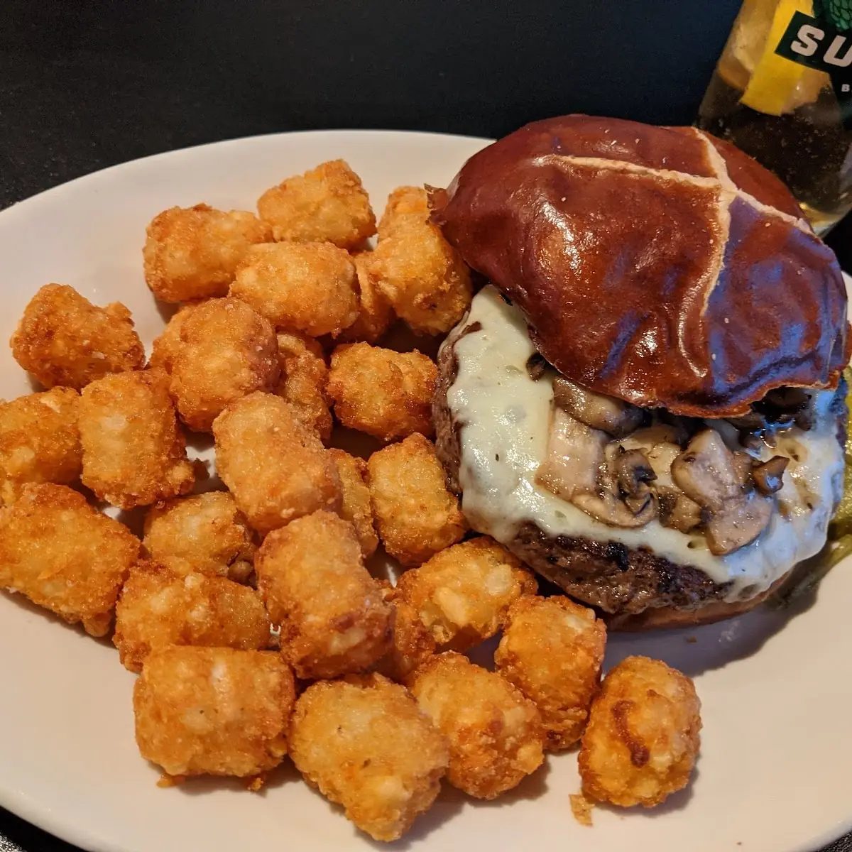 Mushroom and Swiss Burger with Tots
