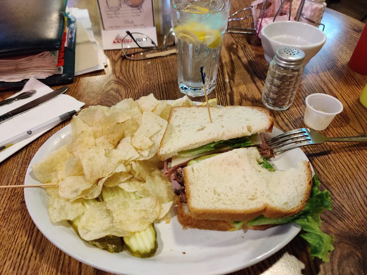 Roast Beef Sandwich with Chips and Pickles