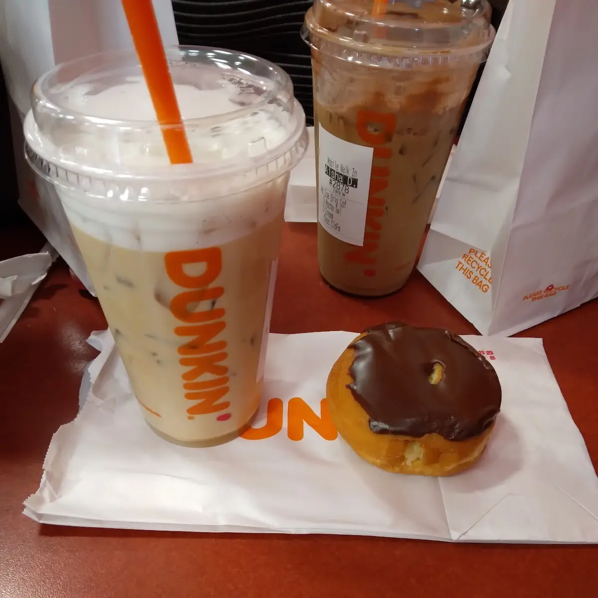 Raspberry Flavored Coffee with a Boston Cream Donuts