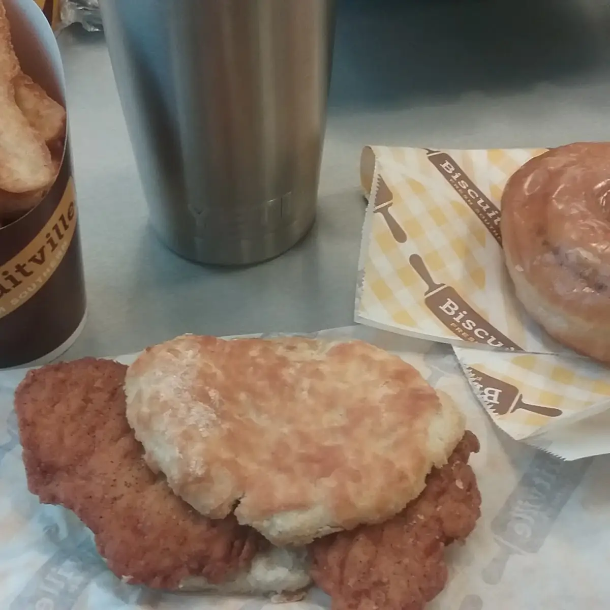 Chicken Biscuit with Fries and a Cinnamon Roll