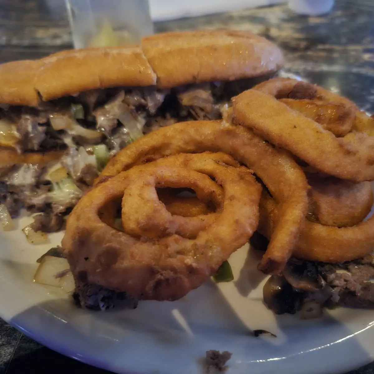 Philly Cheesesteak Sandwich with Onion Rings