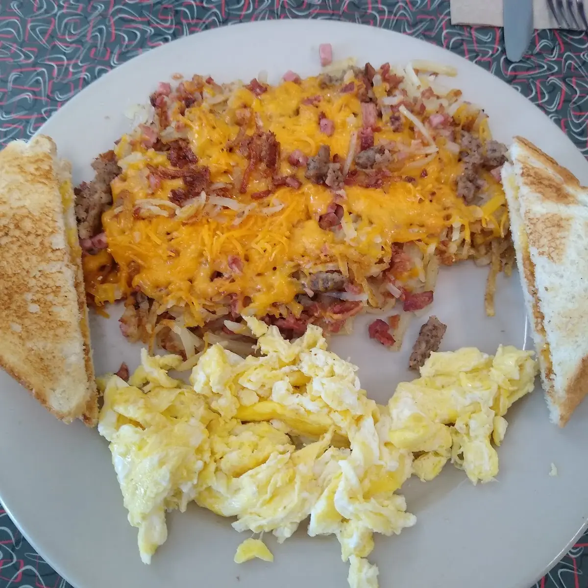 Two Eggs Hash Browns and Toast