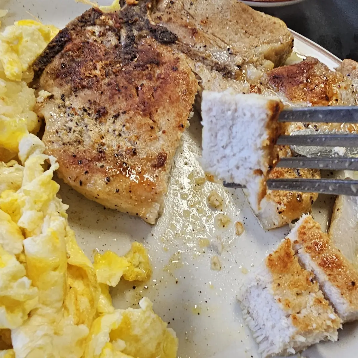Thick Pork Chop with Eggs