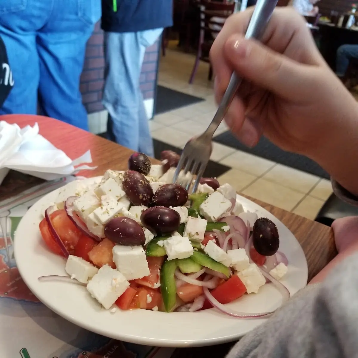 A Greek Salad with Chicken Picatta