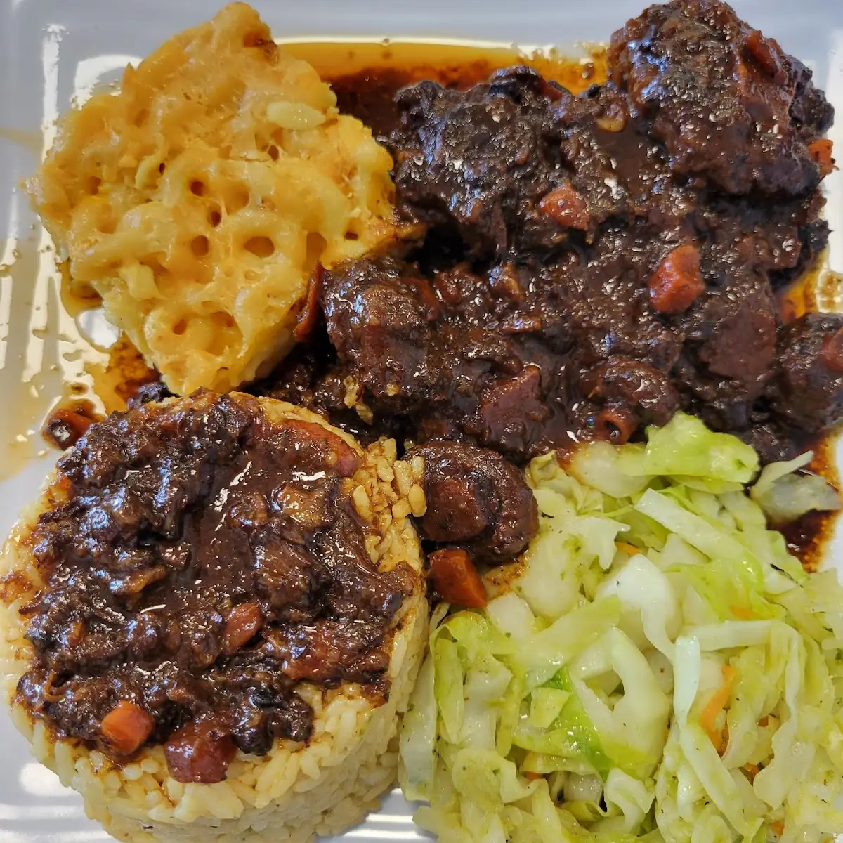 Oxtails Mac and Cheese Cabbage
