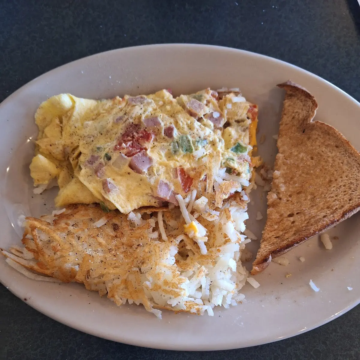 Western Omelet Hashbrowns Biscuit and Gravy