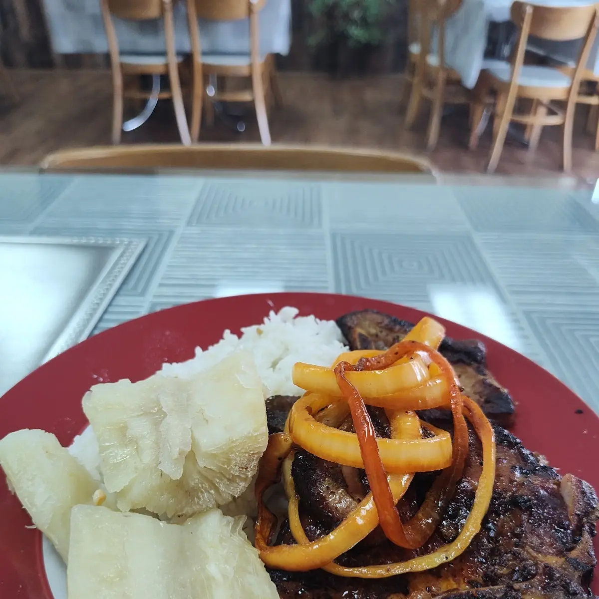 Chuleta Encebollada Pork Chop with Onions