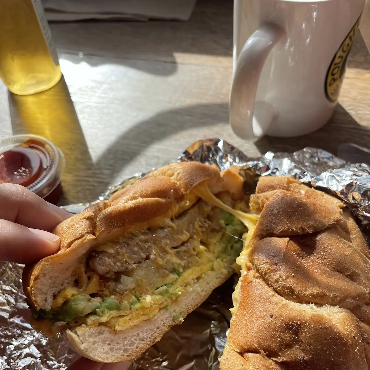 Sausage Egg Cheese Avacado on a Roll