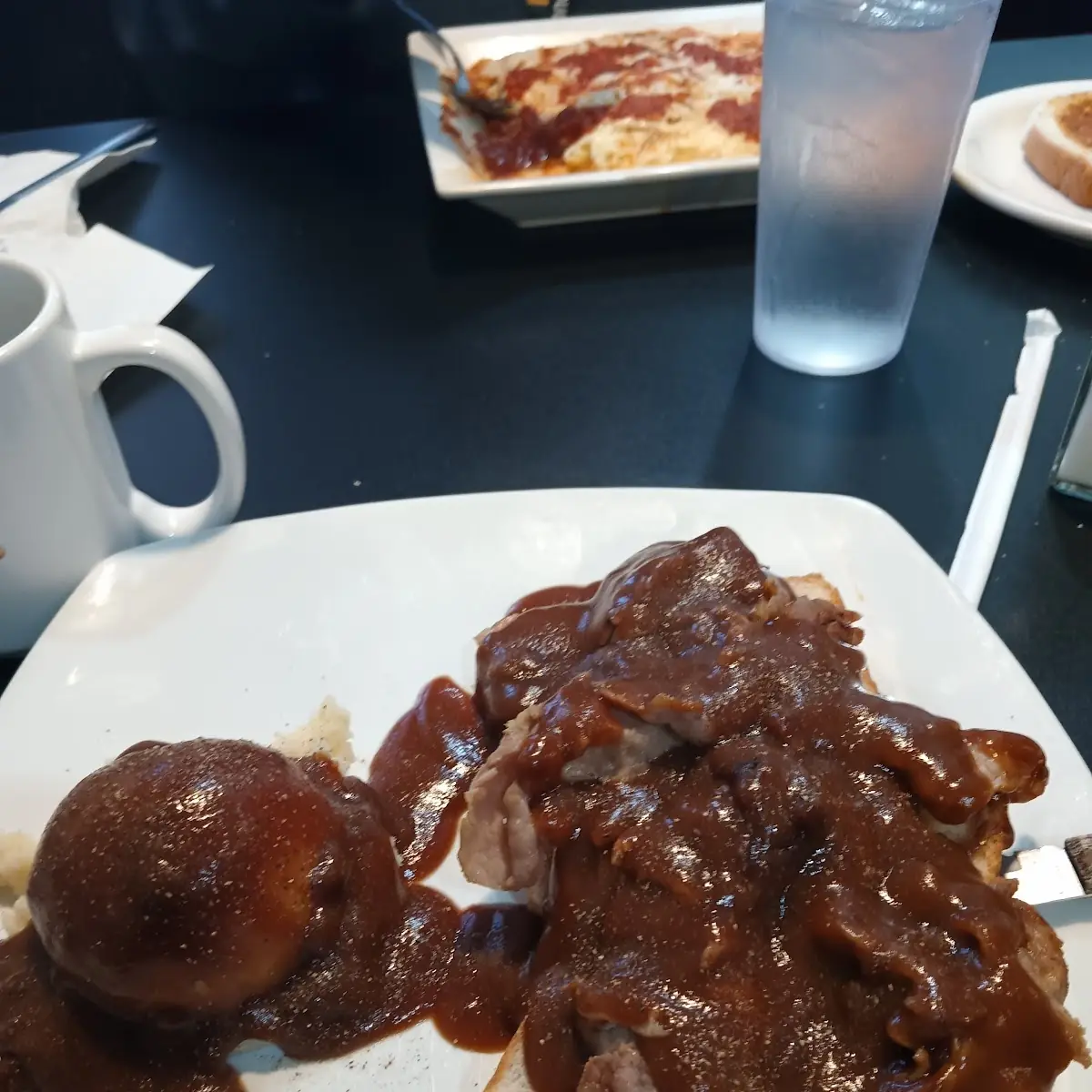 Sliced Beef and Gravy and Mashed Potatoes