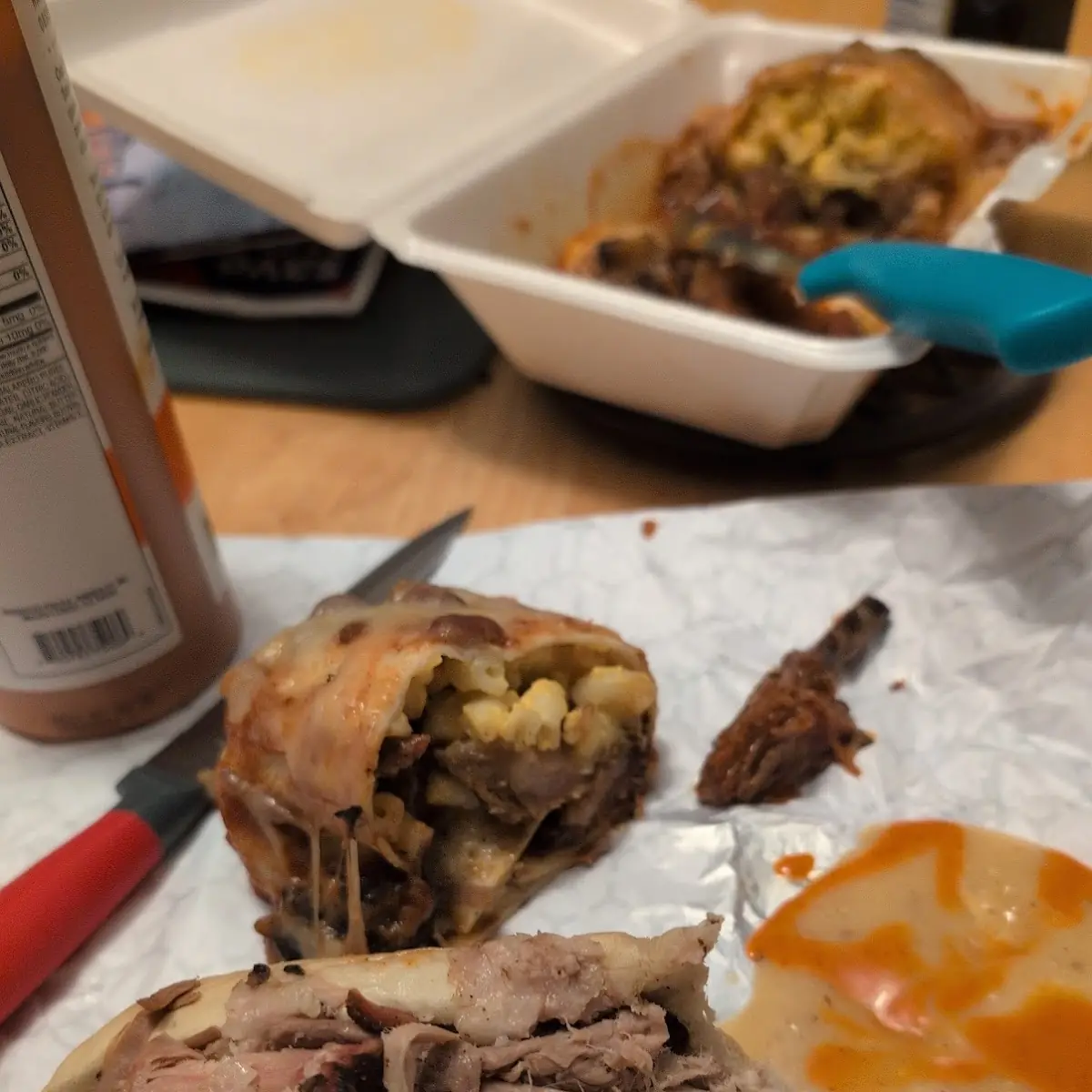 Brisket Burrito and Pulled Pork Sandwich