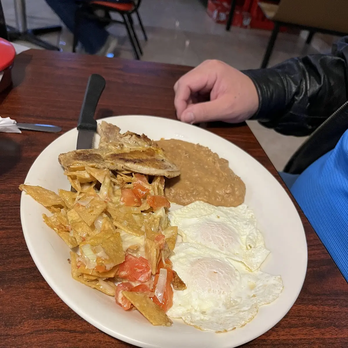 Chilaquiles and Eggs and Pork Chops with Beans