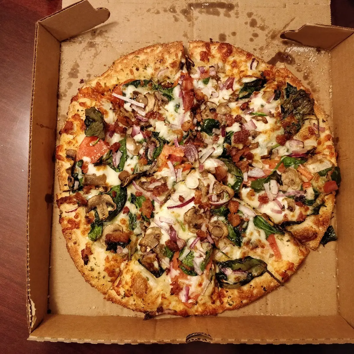 Spinach Deluxe Pizza