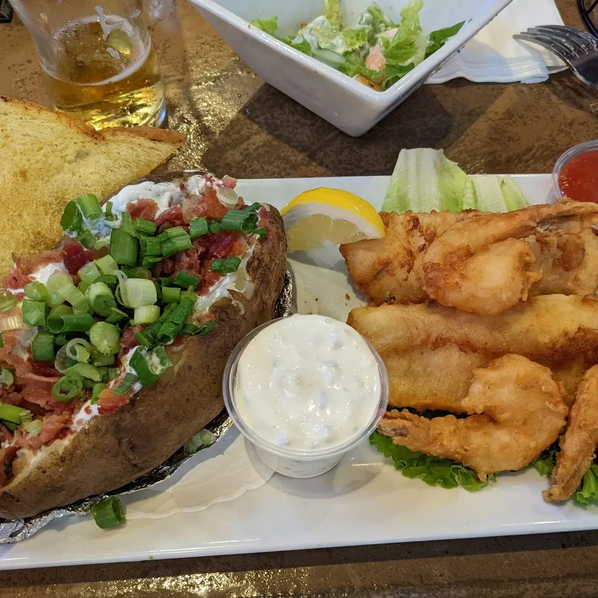 Fried Cod and Prawns with a Fully Loaded Baked Potato