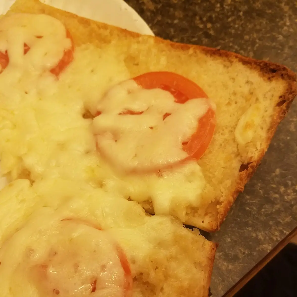 Garlic Bread with Tomato and Cheese