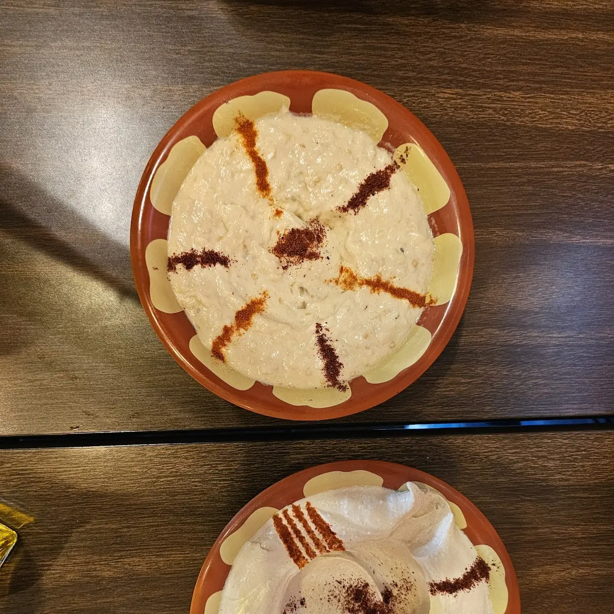 Hummus on Top Babaganouj on Bottom