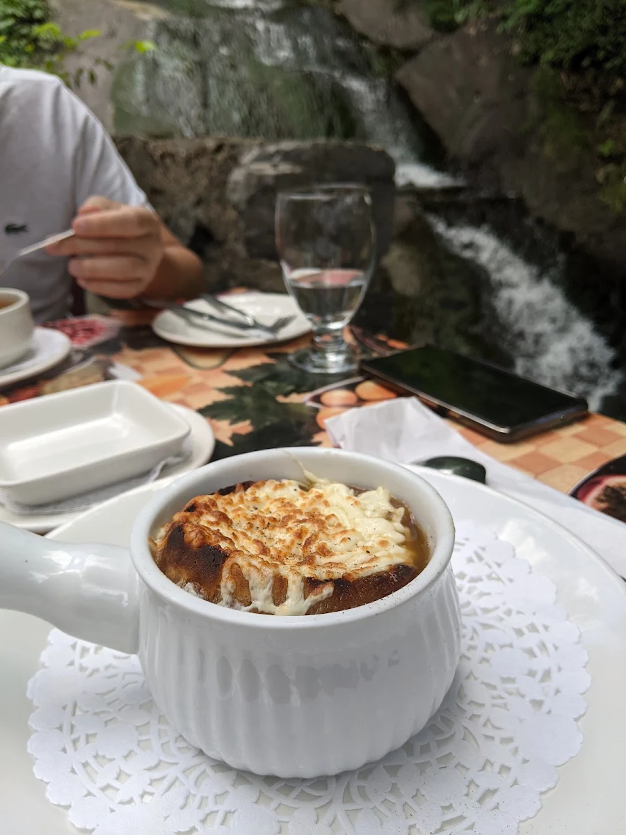 French Onion Soup Made with Black Beer from the Island, Le Moulin de St-Laurent