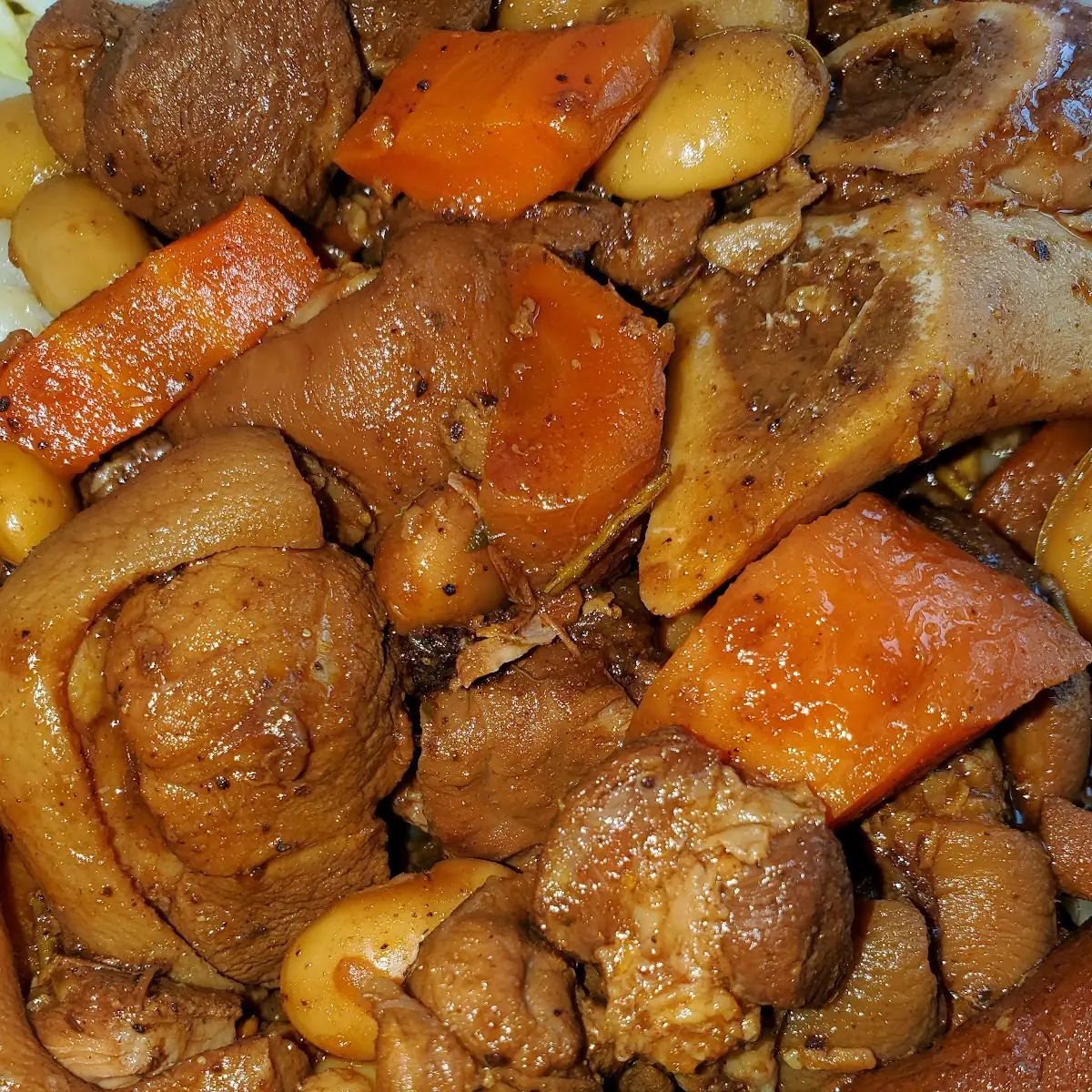 Stewed Pork with Rice & Peas Cabbage and Fried Plantains